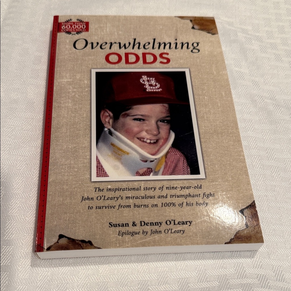 Paperback book. ‘Overwhelming Odds’ by Susan & Denny O’Leary